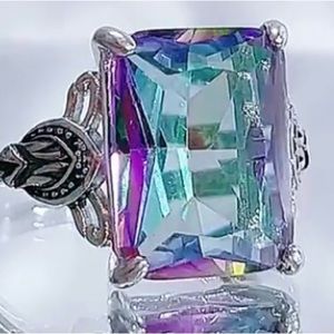 Large rainbow gen, refracts 7 colors. Beautiful!